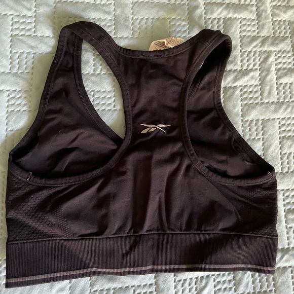 Reebok and Puma top. - Picture 7 of 13